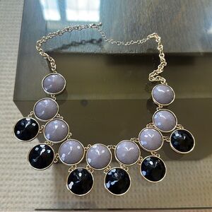 Black and grey necklace plated in gold